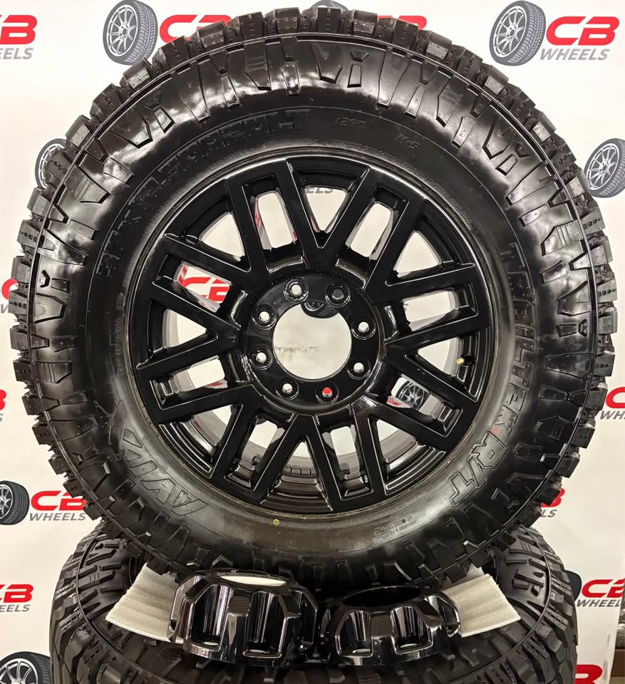 Ford F250/F350 Lariat 20" OEM Gloss Black Takeoff Wheels with 37” Avix Trailtex R/T Tires